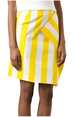 White and yellow cotton blend side flap striped skirt from Jacquemus. Bold stripesHidden side zipLined.Fabric: Mid-weight weave. 97% cotton, 3% elastane.Wash cold.Made in France. Size FR34 Waist 3" Hips 36" Length 26.75" ​Size FR36 Waist 30" Hips 34" Length 26" Striped Skirt, Bold Stripes, Maxi Knit Dress, Skirts Online, Ribbed Knit Sweater, Stripe Skirt, Side Stripe, Scarf Shawl, Cotton Dresses