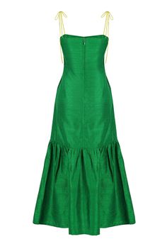 Make a statement at your next special event in the Green Marbella Silk Dress, a midi silhouette with tiered hem and straight neckline. One of our bestselling dresses, it features a beautiful raw silk that gives this piece a luxurious feel with natural shine, complete with handmade fabric buttons and adjustable spaghetti straps in chartreuse. If you wish, you can wear it strapless. Every piece is consciously crafted in collaboration with artisans from South India. Whether you’re headed to an eleg Fitted Tiered Evening Dress, Fitted Tiered Dress For Evening, Chic Satin Dress With Tiered Skirt, Formal Dresses With Ruffle Hem Tiered Skirt, Elegant Fitted Dress With Layered Hem, Chic Silk Tiered Maxi Dress, Chic Tiered Silk Maxi Dress, Formal Tiered Skirt Dress With Ruffle Hem, Formal Silk Dress With Tiered Skirt