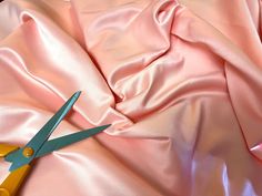 "Plain Duchess Satin polyester fabric by the metre for costume and fashion crafting 60\"/150cm Wide Baby Pink  Width Is: 150 Cm (60\") Weight Is: 175 Gsm One side is matt shiny, and other side is silky shiny.  100% polyester Satin,   Available in half meter or full meters more than one will be sent as a continuous piece   We do our best to Make the photos as Colour accurate as possible however screen colours will sometimes distort it so we recommend that you buy a sample first.   If you are UK(E Baby Pink Silk, Pirate Dress, Baby Rosa, Duchess Satin, Up Costumes, Black Corset, Silk Material, Polyester Satin, Beautiful Blouses