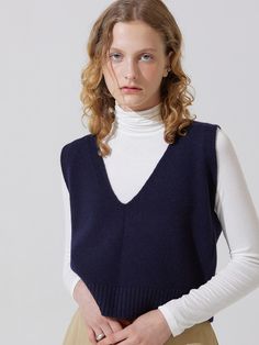 Composition : Wool 100%Color : NavyCountry of Origin : Republic of Korea Blue V-neck Sweater Vest For Fall, Elegant Blue V-neck Vest, Blue V-neck Sweater For Layering, Fall Navy V-neck Tops, Blue V-neck Sweater Vest For Winter, Blue Cashmere V-neck Sweater, Blue V-neck Cashmere Sweater, Blue Knit V-neck Vest, Chic Knit V-neck Vest