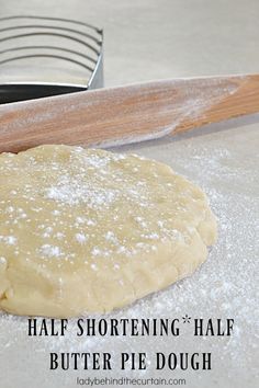 half shortening half butter pie dough next to a spatula on a counter top