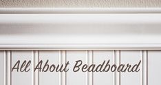 the words all about beadbband are written in black on a white paneled door