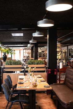 an empty restaurant with tables and chairs