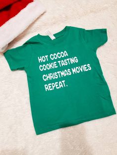 Match With Your Little This Christmas! Child's Shirt NB- 24M are bodysuit 2T-14 Youth are tshirts 100% combed ringspun cotton fine jersey Topstitched ribbed collar Adult Shirt Heathers: 4.2 oz., 52/48 Airlume combed and ringspun cotton/polyester, 32 singles Solids 100% ringspun cotton Athletic Heather & Black Heather are 90/10 airlume combed and ringspun cotton/polyester Unisex sizing Coverstitched collar and sleeves Shoulder-to-shoulder taping Washing Instructions: Wash on cold and delicate Christmas Mommy And Me Shirts, Green Christmas T-shirt With Letter Print, Christmas Green T-shirt With Letter Print, Holiday Green T-shirt With Letter Print, Green Letter Print T-shirt For Holiday, Green Cotton T-shirt For Holiday, Festive Green Short Sleeve Top, Christmas Short Sleeve Top With Funny Text, Green Christmas T-shirt For Holiday