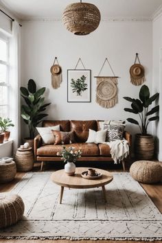 a living room filled with furniture and potted plants