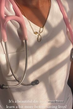 a woman with a stethoscope on her neck