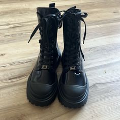 I Got These Boots For $392 And I Am Trying To Sell Them For $200 But Price Is Definitely Negotiable! They Are Brand New And Haven’t Been Worn They Are Just The Wrong Size For Me. They Are Shiny Leather And Black. Please Buy!! Luxury Black Lace-up Boots With Lug Sole, Luxury Black Platform Boots With Lug Sole, Elegant Black Combat Boots For Fall, Luxury Black Lace-up Boots With Reinforced Heel, Elegant Black Combat Boots With Round Toe, Black Formal Lace-up Boots With Lug Sole, Elegant Black High Ankle Combat Boots, Luxury Black Lace-up Boots, Black Combat Boots With Lug Sole For Formal Occasions