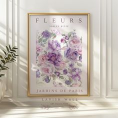 there is a vase with flowers in it next to a poster on the wall that says fleurrs