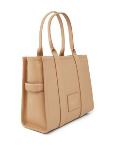 Find MARC JACOBS The Medium Leather Tote Bag on Editorialist. beige calf leather debossed logo to the front two top handles top zip fastening adjustable detachable shoulder strap main compartment internal zip-fastening pocket internal logo patch Marc Jacobs Leather Tote Bag, Marc Jacobs Tote Bag, Marc Jacobs Tote, Debossed Logo, The Medium, Leather Tote Bag, Womens Tote Bags, Leather Tote, Patch Logo