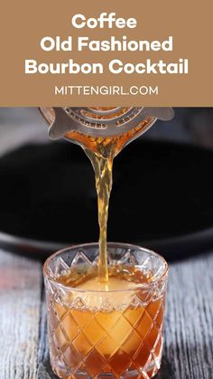 an old fashioned bourbon cocktail being poured into a glass with the words, coffee old fashioned bourbon