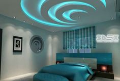 a modern bedroom with blue and white decor on the ceiling, round lights above the bed