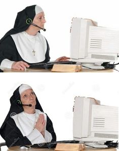 the nun is typing on her computer while wearing a headset and using a mouse