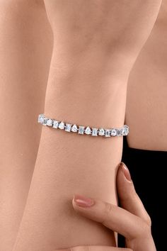 925 sterling silver tennis bracelet with pear and octagon shaped swarovski zirconia. - Aza Fashions