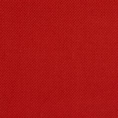 a red fabric textured with small dots