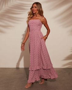 Step into summer sunset vibes with the Naiara Tiered Maxi Dress. Made from lightweight crepe fabric adorned with a charming floral print, this dress offers an effortlessly chic silhouette. The tiered design adds a touch of whimsy and movement, perfect for warm evenings and beachside gatherings. Embrace relaxed elegance and elevate your summer style with this breezy, sophisticated maxi dress. Square neckline Adjustable shoulder straps Side slant pockets Lightweight fabric Runs Large Hidden back z Relaxed Elegance, Western Wear Dresses, Sunset Vibes, Mauve Dress, Dresses By Length, Summer Sunset, Tiered Maxi Dress, Floral Stripe, Crepe Fabric