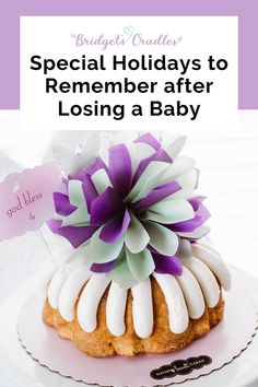 Looking down at a Bundt cake that is decorated with a festive paper flower. Baby Due, Memory Tree