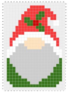 a cross stitch christmas ornament with santa's hat