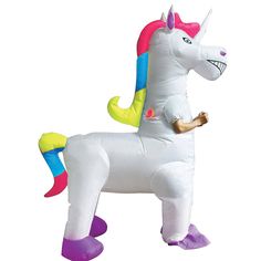 an inflatable unicorn is standing on its hind legs