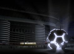 a large soccer ball is lit up in the dark