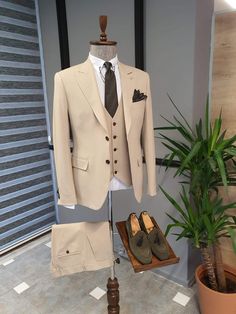 🔥 NEW COLLECTİON Collection : SPRİNG / SUMMER - 21 Product : Vince Slim Fit BiStretch Biege Suit Color code : BEİGE Available Size : 46-48-50-52-54-56Suit material : %65 Linen , %30 Cotton , %5 Elestan Machine washable : No Fitting : slim-fit Cutting : double slit, double button Remarks : Dry Clean Only Package included : Jacket , vest , pants Suit Clothes, Clothes Jacket, Tan Suit, Earthy Wedding, Beige Suits, Pants Gift, Dress Suits For Men, Designer Suits For Men, Suit Material