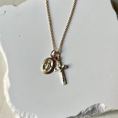 Introducing 'Lydia', our stunning Crucifix and Miraculous Medal charm necklace, a harmonious blend of faith and elegance. Handcrafted in New York, this necklace is available in 14k gold-filled or 925 sterling silver, offering timeless sophistication.  * 16", 18" with optional 2" extender * 14K Gold Filled or 925 Sterling Silver * Water and Tarnish Resistant * Spring Clasp Miraculous Medal Necklace, Crucifix Necklace, Silver Water, Miraculous Medal, Brown Kraft, Necklace Gold, Types Of Metal, Charm Necklace, Necklace Etsy