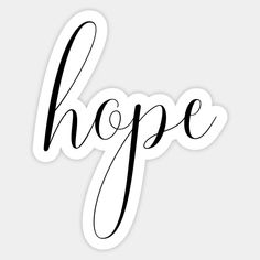 the word hope is written in black ink on a white sticker that says hope