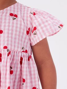 This baby girl's dress features a timeless plaid pattern, charming cherry print, and comfortable short sleeves. Made with a crew neck design, it's perfect for any occasion. Dress your little one in style and comfort with this adorable and versatile piece. COLOR Pink MATERIAL Cotton SEASON Summer SIZE (AGE) 90 (12-24M), 100 (2-3Y), 110 (3-5Y), 120 (5-7Y), 130 (7-8Y), 140 (8-10Y) GENDER Baby Girl, Girl PATTERN Plaid (Checked, Tartan, Gingham), Fruit (Vegetable) Short Sleeves Dress, Cherry Fruit, Girl Silhouette, Pink Cherry, Kids Trend, Cherry Print, Sleeves Dress, Fruit Print