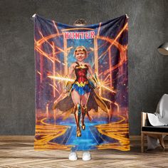 a shower curtain with a woman dressed as wonder in front of an image of the movie's character