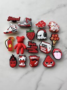 red shoe charms, croc compatible charms, pvc shoe charms, plastic charms for crocs, red charms for your crocs, bear shoe charms Customize your Crocs with these super cute Croc compatible charms. CHECK THE CHARM SECTION FOR 1000'S OF DESIGNS  NEED A CERTAIN DESIGN? SEND ME A MESSAGE AND I WILL CHECK MY EXISTING AND PRIVATE CATALOG  We don't offer coupon codes, but we pay for shipping  when you buy 12 or more charms.  THIS LISTING IS FOR 1CHARM OF YOUR CHOICE -material of the charm is a flexible plastic- these are put together by people so not all the backs of the charm will be centered  YOU ARE RESPONSIBLE FOR PROVIDING THE CORRECT ADDRESS IF YOU GIVE WRONG OR INCOMPLETE ADDRESS YOU ARE RESPONSIBLE FOR PAYING THE SHIPPING CHARGES TO RE SHIP YOUR ORDER -Inserting Instructions- 1 Simply push Giblets For Crocs, Red Croc Charms, Red Crocs With Charms, Spiderman Croc Charms, Crocs Gibbets, Crocs Charms Aesthetic, Croc Charms Ideas, Croc Charms Aesthetic, Croc Gibbets