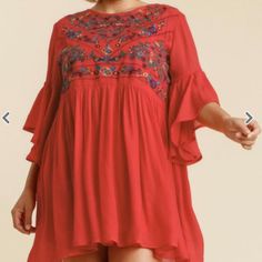 Color Is Not A True Red. Has A Watermelony Coraly Hint To It. Flowers Are Embroidered. Fabric Is Light And Flowy. Perfect For A Beach Vacation This Spring And Summer! Fit Is True To Size. I Have Large Arms And They Still Fit In Sleeves. Fabric Content 70% Rayon, 30% Polyester Model Is 5' 10" And Is Wearing An Xl Red Floral Embroidered Summer Mini Dress, Red Floral Embroidered Mini Dress For Summer, Red Summer Mini Dress With Floral Embroidery, Red Floral Embroidery Mini Dress For Summer, Red Floral Embroidery Mini Dress For Spring, Spring Embroidered Red Mini Dress, Red Bohemian Embroidered Dress With Floral Print, Flowy Rayon Dress With Floral Embroidery, Red Floral Print Embroidered Summer Dress