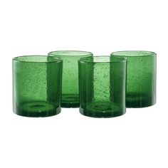 three green glasses sitting next to each other