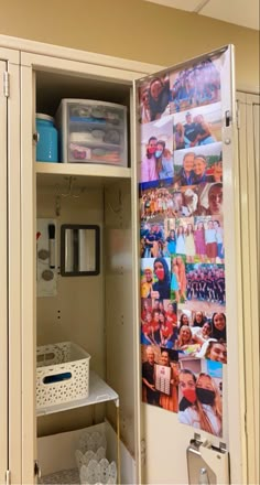 an open locker with pictures on the wall