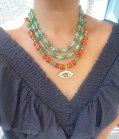 Elegant Green and Orange Multi Strand Big Bold Beads Necklace Set, Chunky Carnelian,Agate and Aventurine Bib Necklace,Multi Stone Handmade Gemstone Jewelry for Women That elegant necklaces are designed with genuine carnelian,agate and aventurine stone. They are two separate necklaces as two strand green and evil eye necklace.You can wear them separately or together.  🔴 30% Discount for 2 items use the code: 2ITEMS30 🔴 35% Discount for 3 or more items use the code: MOREITEM35 Visit my shop for Bohemian Green Agate Necklaces, Bohemian Agate Necklace With Large Beads, Carnelian Jewelry With Colorful Beads For Jewelry Making, Bohemian Green Agate Crystal Necklaces, Bohemian Orange Beaded Necklaces With Gemstones, Orange Gemstone Bohemian Beaded Necklace, Bohemian Orange Beaded Necklace With Gemstones, Bohemian Orange Gemstone Necklaces, Orange Bohemian Beaded Necklace With Gemstones