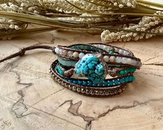 3 Wrap Leather Bracelet in Colors of Gold and Turquoise in 3 Different Sections , Enamel Button With Trees & Full Moon and Bird Charm - Etsy Türkiye Artisan Turquoise Hand Wrapped Wrap Bracelet, Artisan Hand Wrapped Turquoise Wrap Bracelet, Handmade Adjustable Spiritual Wrap Bracelet, Bohemian Hand Wrapped Turquoise Braided Bracelets, Bohemian Turquoise Hand Wrapped Braided Bracelets, Bohemian Turquoise Hand-wrapped Braided Bracelets, Bohemian Turquoise Braided Bracelets, Adjustable Turquoise Bohemian Wrap Bracelet, Adjustable Bohemian Turquoise Wrap Bracelet