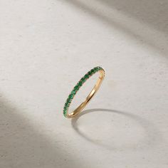 Loved for its barely there, stackable design and versatility, our Thread Ring is the most perfect choice for the modern woman. Sparkling emeralds are hand set in elegantly sculpted prongs that extend three quarters around the finger. For the minimalist, we love it as an everyday essential that can be worn on its own for an elegant and understated appearance. For those who fancy a more elaborate look, stack together multiples for a more significant statement. It can also serve as a beautiful comp Emerald Ring Design, Thread Ring, Alexandrite Ring, The Minimalist, Emerald Ring, High Jewelry, Modern Woman, Ring Designs, Women Rings