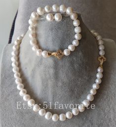 Jewelry: fresh water pear, genuine cultured pearl Color: white Grade: A have natural blemish and growth rings as photos Size: 9-9.5mm; off round Length: necklace offer different length. Bracelet about 7.5-8 inch! Handwork: knotted between every 2 pearl bead Metal: alloy Shipping: I will send out your order in 1-5 business days. Usually will take about 25-50 business days. As seller, I really hope you will receive your parcel the earlier the better. Best regards! Classic White Pear-shaped Jewelry, Classic Pear-shaped White Jewelry, Delicate White Jewelry Sets For Anniversary, Classic White Pearl Bracelet For Mother's Day, Formal Pearl Jewelry For Mother's Day, Elegant Formal Jewelry Sets For Mother's Day, Mother's Day Pearl Charm Jewelry, Mother's Day Round Pearl Charm Jewelry, Adjustable Elegant Pearl Necklace For Mother's Day