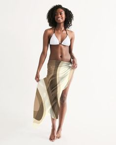 Our Sheer Sarong Swimsuit Cover Up Wrap / Lightweight Shoulder Drape Scarf, embodies versatility and style. This chic scarf accessory effortlessly transitions from a shoulder shawl to a beach cover-up, offering multiple styling options for any occasion. Crafted from sheer fabric, this lightweight scarf wrap adds an elegant touch to your beach ensemble, doubling as a fashion scarf for ladies seeking both functionality and flair. Whether lounging poolside or strolling along the shore, our oversized scarf serves as the perfect cover-up wrap for swimsuits, ensuring you stay cute and stylish under the sun. Accessorize with confidence and embrace the multiuse capabilities of this versatile sarong cover-up, a must-have addition to your beachwear collection. 100% Polyester material Lightweight, fl Sarong Swimsuit Cover, Shoulder Shawl, Brown Swimsuit, Chic Scarves, Beachwear Collection, Lightweight Scarf, Chic Accessories, Swimsuit Cover, Sarong