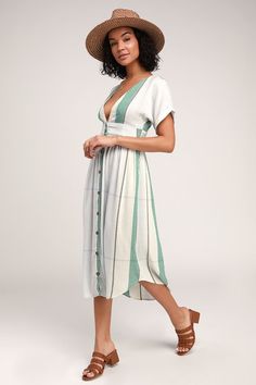 A classic beauty like you deserves a classic dress like the O'Neill Reid Light Blue Multi Stripe Button-Up Midi Dress! A flirty deep V-neck bodice and cuffed short sleeves, made from breezy, woven cotton-blend fabric in a light blue, green, cream, and washed black stripe print top a wide, banded waist. Cute wooden button placket travels down the front of a matching A-line midi skirt with a rounded hem. Metal logo tag at back. Fit: This garment fits true to size. Length: Mid-calf length. Size med Short Sundress, Spring Business Casual, Fashion District, Full Skirts, Mini Sundress, Tank Top Dress, Lightweight Dress, Light Blue Green, Button Up Dress