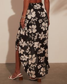 Wrap skirt Front slit Floral print Midi length Satin fabrication Side zipper closure Lined Self: 100% Polyester, Lining: 98% Polyester 2% Spandex Wrap Midi Skirt, Swim Shop, Black Midi Skirt, Wrap Skirt, Modern Classic, Midi Length, Side Zipper, Midi Skirt, Floral Print