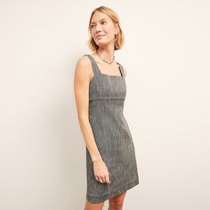 The Jennifer has the vibe of a little summer dress—but actually offers a generous amount of coverage. The straight silhouette skims the body without being tight, the hemline hits just above the knee, and wide straps conceal your bra straps. Thanks to our Japanese cotton tweed fabric, it also maintains its structure throughout the day.  Made in Vietnam with fabric from Japan. Chic Summer A-line Tweed Dress, Fitted Mini Tweed Dress For Summer, Fitted Tweed Summer Dress, Summer A-line Tweed Dress For Work, Fitted Sleeveless Tweed Summer Dress, Spring Fitted Mini Length Tweed Dress, Chic Fitted Mini Length Tweed Dress, Fitted Knee-length Linen Mini Dress, Fitted Linen Mini Dress Knee-length