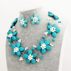 "Material: Howlite Turquoise ,Fwpearl Bead size: 4mm-6mm-8mm-10mm,15*15mm,15*20mm,20*30mm Necklace size: 18\" + 2\" extension chain Color:As show Packing: Beautiful Pouch All items in my shop are made to order. Most of the time it takes 1-3 business days but can be longer at times and for larger orders. If you want to order of different style. Please contact me . ----------------------------------------------------- Please feel free to convo me should you have any question! Thank you! :)" Turquoise Flower-shaped Jewelry Gift, Turquoise Flower-shaped Jewelry For Wedding, Turquoise Flower Jewelry For Wedding, Turquoise Flower-shaped Wedding Jewelry, Turquoise Pearl Jewelry With Round Beads, Handmade Turquoise Flower-shaped Jewelry, Blue Beaded Jewelry For Mother's Day, Blue Flower Shaped Jewelry For Mother's Day, Blue Flower-shaped Jewelry For Mother's Day