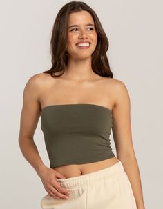 Tilly's Tube Top. Solid Color. Sleeveless. Cropped Fit. 60% Cotton, 36% Rayon, 5% Spandex. Machine Wash. Imported. Model Is Wearing A Size Small. Model Measurements:height: 5'8" Bust: 34"waist: 24"hips: 35" | Tillys Tube Top Casual Tube Top With Built-in Bra, Casual Strapless Camisole With Built-in Bra, Seamless Stretch Sleeveless Tube Top, Seamless Sleeveless Tube Top For Spring, Seamless Sleeveless Spring Tube Top, Casual Bandeau Seamless Crop Top, Casual Seamless Bandeau Crop Top, Casual Bandeau Camisole For Summer, Stretch Bandeau Camisole