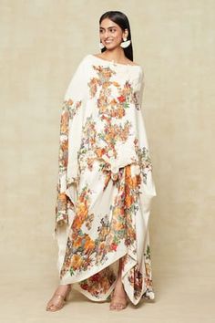 White cape with multi colored floral prints and embroidered highlights. Comes with coordinating printed draped skirt. - Aza Fashions Spring Floral Print Sets With Traditional Drape, Fitted Floral Print Draped Set, White Bohemian Sets With Digital Print, Bohemian White Set With Digital Print, Anamika Khanna Cape, White Cape, Anushree Reddy, Sanya Malhotra, Anamika Khanna