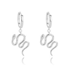 Our cute snake stainless steel earrings are the perfect accessory for adding a touch of edge to your look. Made with high-quality stainless steel, they are durable and resistant to tarnish. The intricate snake design is eye-catching and unique, making them a standout piece. Wear them with your favorite outfits to add a touch of personality and style. Comes in a set of studs and hoops.Material: Stainless Steel. Trendy Snake-shaped Earrings For Gifts, Trendy Snake-shaped Metal Jewelry, Silver Snake Shape Metal Earrings, Silver Snake Shaped Metal Earrings, Silver Snake-shaped Metal Earrings, Silver Snake Shape Earrings, Silver Snake-shaped Earrings, Silver Snake-shaped Earrings For Pierced Ears, Silver Snake-shaped Pierced Earrings