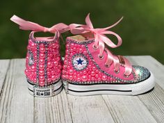 Pink Bedazzled Converse Sneakers, Little Kids Shoe Size 11-3 Information about the shoes All sneakers are Converse brand and have a mix of hand applied high quality glass crystals and resin flat-backs. Please select your color choice by the available drop down options, an option of all glass crystals no color is also available. Converse sizing is unique and sneaker specific. Converse Kids Chuck Taylor All Star Sneakers are expected to run a half-size large. Custom Orders are also available and a Pink Embellished Sneakers For Party, Pink Embellished Sneakers With Round Toe, Pink Embellished Round Toe Sneakers, Bedazzled Converse, Ladybug Tutu, 1st Birthday Tutu, All Star Sneakers, Handmade Tutu, Pink Converse