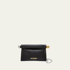 Jacquemus "La Petite Pochette Rond" clutch bag in leather  Features logo lettering  Detachable chain shoulder strap Can be worn as a clutch or shoulder bag  Fold-over flap top with magnetic closure; hardware accent  Interior, one card slot  Lining: Cotton Approx. 4.9"H x 7.6"W x 2.6"D Made in Italy Chic Evening Wallet On Chain With Metal Logo, 6 D, Letter Logo, Bergdorf Goodman, Magnetic Closure, Top Designers, Card Slots, Clutch Bag, Tops Designs