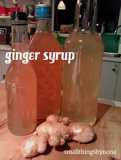 ginger syrup and ginger root sitting on a kitchen counter with the words ginger syrup above it