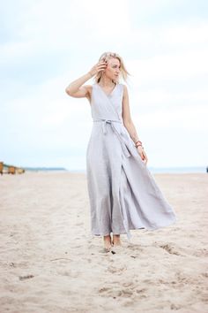 "Stunning long V-neck wrap natural linen dress! Very comfortable universal dress. Details * weight: 205 g/m² or 6.05 oz/yd² * 100% natural Baltic linen * softened * breathable, anti-allergic * light, very durable and strong * easy to wash * suitable for children * OEKO-TEX® Standard 100 certified (guarantees you that it meets ecological requirements) Model wears size S, 172 cm/5'7\" tall. GARMENTS ARE DESIGNED FOR 164-176 CM HEIGHT ( 5'5\"-5'9\") PLEASE LEAVE A NOTE WITH YOUR ORDER, IF YOUR HEIG Linen Dresses Elegant, White Linen Skirt, Natural Linen Dress, Elegant Summer Dresses, Black Linen Dress, Long Linen Dress, Fall Wedding Guest Dress, Circle Dress, Summer Linen Dresses