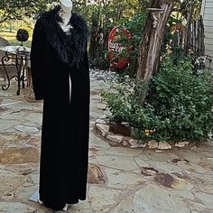 Vintage 90's Cdc Evening Long Gown Over Coat Black Velvet Feather Boa Neckline Perfect For Evening Wear Or For Halloween, A Witch, Cruella Deville, Elvira Size 12 But Only Fastens At The Top, Or Leave Open Long Sleeves Clean And Fresh 90% Polyester, 10% Spandex Elegant Black Full Length Outerwear, Black Formal Outerwear With Feather Trim, Formal Black Outerwear With Feather Trim, Fitted Black Outerwear With Feather Trim, Fitted Feather Trim Outerwear For Evening, Fitted Long Evening Outerwear, Black Long Evening Outerwear, Black Long Outerwear For Evening, Fitted Long Outerwear For Evening