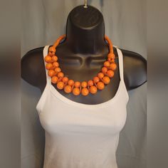 Orange Double Beaded Necklace Set With Orange Beaded Earrings Orange Faceted Beads Jewelry, Orange Beaded Costume Jewelry Necklaces, Elegant Orange Beaded Necklace With Wooden Beads, Costume Jewelry Beaded Necklace With Wooden Round Beads, Orange Large Beaded Jewelry For Party, Costume Jewelry Beaded Necklace With Wooden Beads, Orange Jewelry With Round Wooden Beads, Orange Wooden Beads For Jewelry Making, Orange Wooden Beaded Jewelry